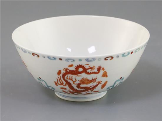 A Chinese doucai dragon bowl, D. 13cm